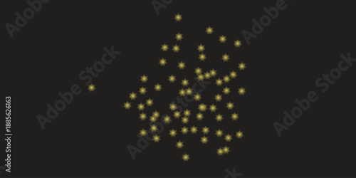 A blurry cluster of yellow and white dots on a black background
