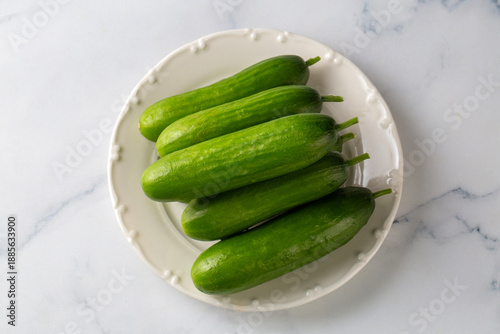 Fresh cucumber slices in bowl
