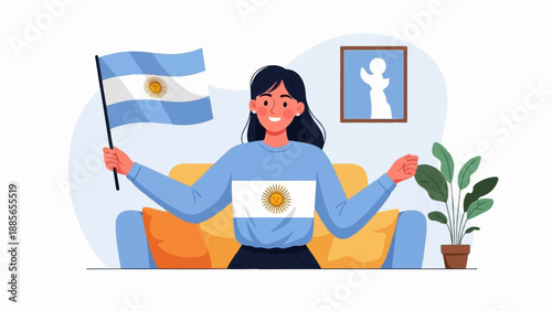 Enthusiastic person waving flag on couch with plant and artwork