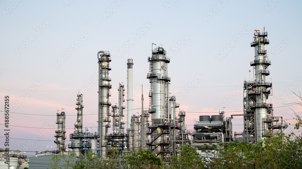 Obraz premium Oil and Gas Industrial zone,The equipment of oil refining,Close-up of industrial pipelines of an oil-refinery plant,Detail of oil pipeline with valves in large oil refinery.