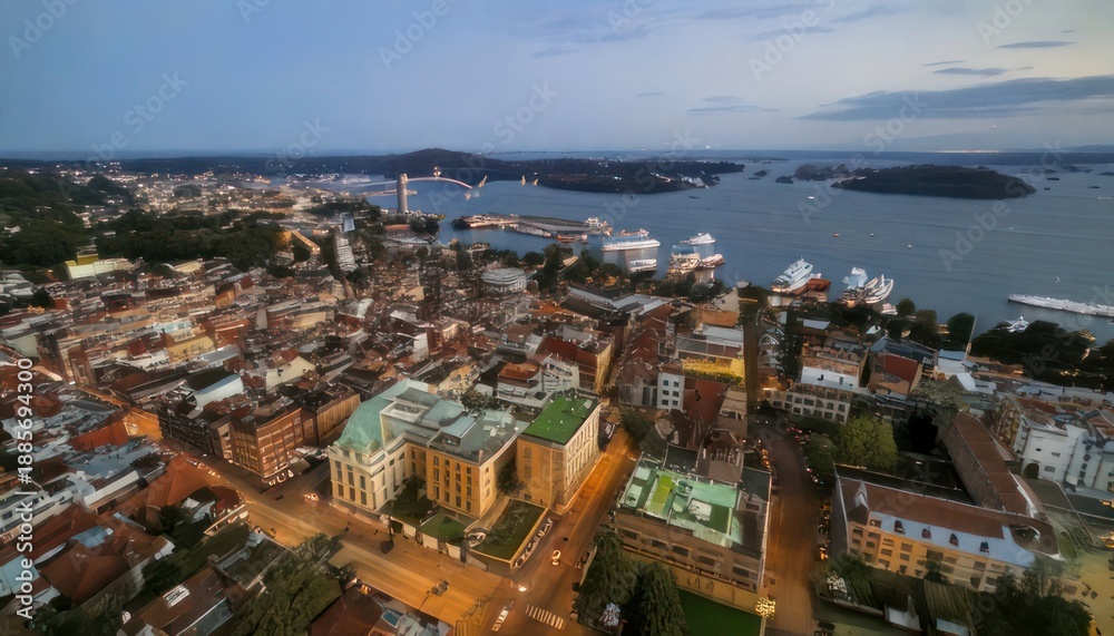 Fototapeta premium Aerial view of Helsinki, Finland at dusk with city lights.