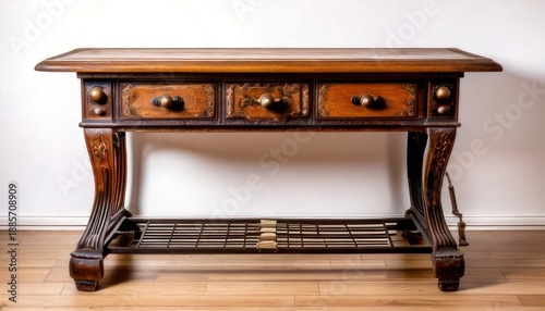 Antique Wooden Table with Drawers and Shelf Against White Wall.