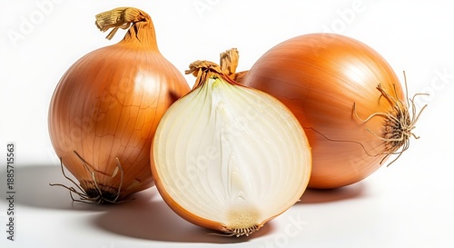 Wallpaper Mural Close-up of fresh, ripe yellow onions, with one neatly sliced in half, showcasing their natural layers and culinary readiness against a clean white background Torontodigital.ca