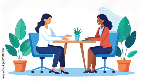 Two women are having a professional discussion during a formal meeting indoors