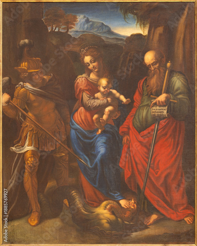 BUSTO ARSIZIO, ITALY - JANUARY 19, 2026: The painting of Madonna with the St. Michael and St. Paul in the church Santuario di Santa Maria di Piazza as the copy of Giovanni Paolo Lomazzo (1571)