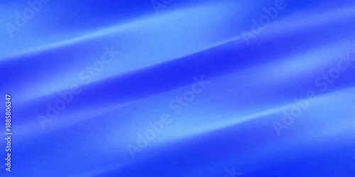 Smooth flowing blue silk and satin fabric creates an abstract wave background with a soft light texture and artistic motion blur design