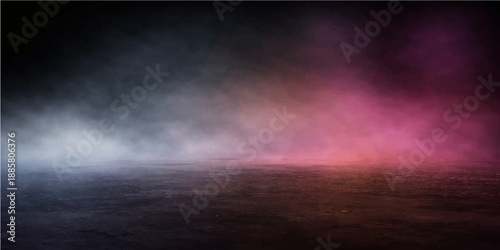 Dark blue night sky filled with heavy storm clouds and thick mist creating an abstract texture of nature and light against the black space