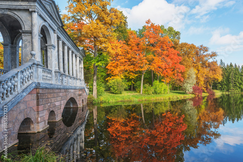Stone bridge in the autumn park.