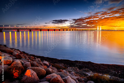 One of the longest bridges in Europe, Cable-Stayed Bridge Øresund during sunset, building structure connecting two cities, Malmö, Sweden, Scandinavia.