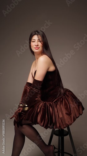 Wallpaper Mural Beautiful woman in an elegant dress posing gracefully. Concept of a beautiful woman. Torontodigital.ca