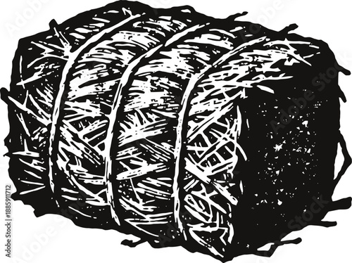 Round hay bale tied with rope, traditional farming and agricultural feed material