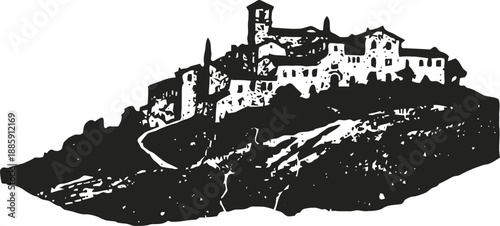 Silhouette of historic hilltop village with clustered buildings and towers