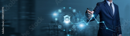 Obraz na płótnie Businessman touches banking data chart with pen and performs evaluation on online banking platforms, digital transactions, fintech solutions, and secure financial operations
