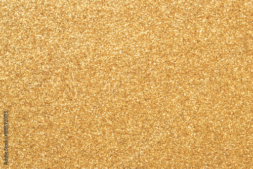 A rich gold glitter texture fills the frame, creating a luxurious and festive...