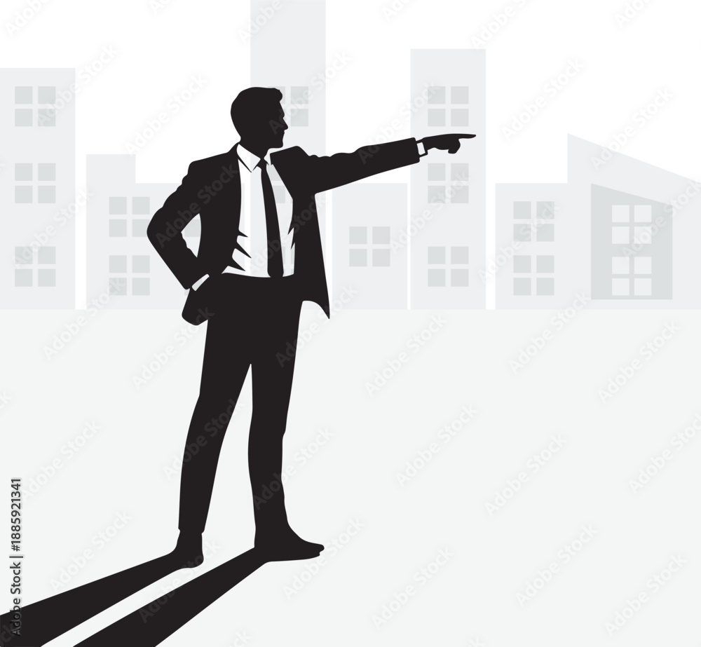Fototapeta premium A confident businessman pointing towards the future in a cityscape