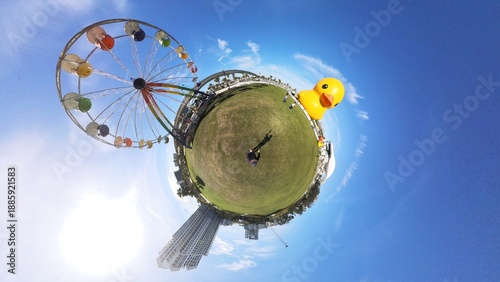 Φωτογραφία "Tiny Planet" 360 degree image of Coachman Park giant Duck and Ferris wheel