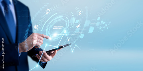 Принти на полотні Procurement manager using the tablet and analyzing procurement management data