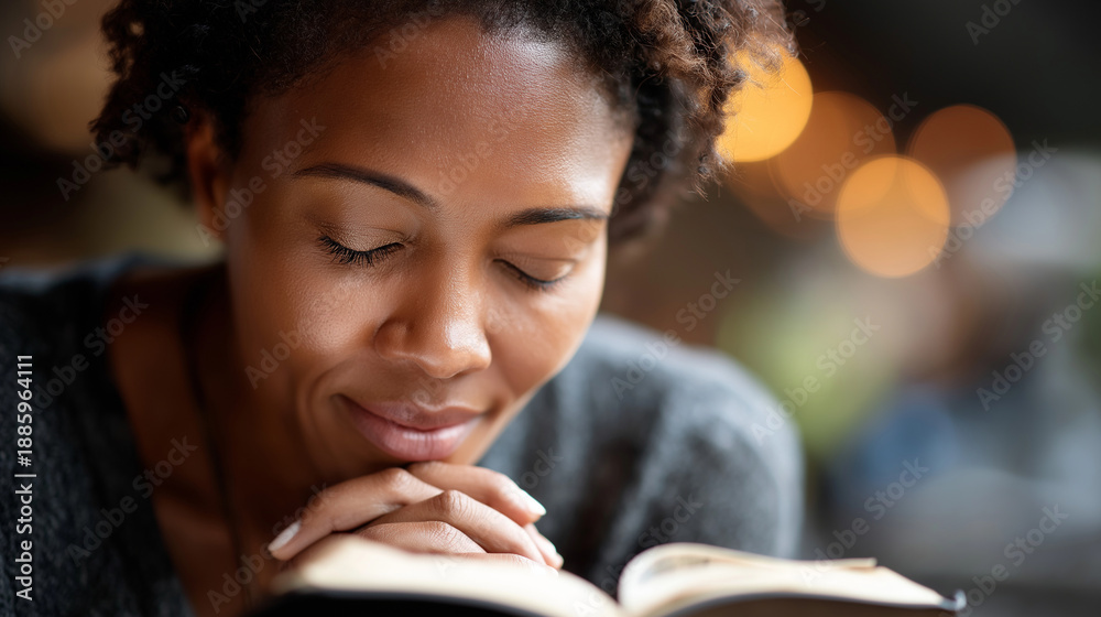 © Nataliya - African American woman praying with bible in hands, faceless believer, religious devotion, scripture reading, spiritual practice, faith moment, defocused background, with copy spac © Nataliya - African American woman praying with bible in hands, faceless believer, religious devotion, scripture reading, spiritual practice, faith moment, defocused background, with copy spac