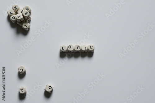 Photos The word LOGIC spelled with letter blocks on a clean white background