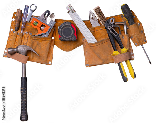 Photos Mechanic's belt with tools ready for use. Isolated background.