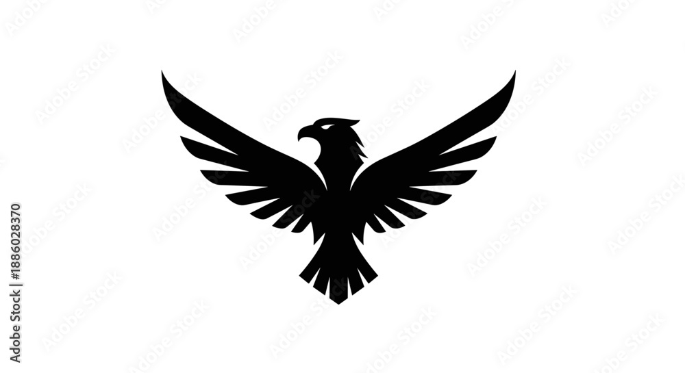 Obraz premium Silhouette of a Majestic Eagle with Wings Spread Wide.