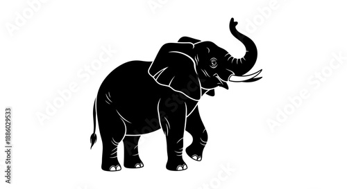 Silhouette of an African Elephant with Trunk Raised 2.
