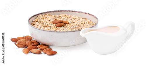 Tableau sur toile Oat flakes, almond milk and nuts isolated on white