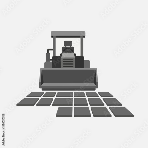 Heavy Machinery Bulldozer Placing Square Pavers For New Roadway Project Construction Site