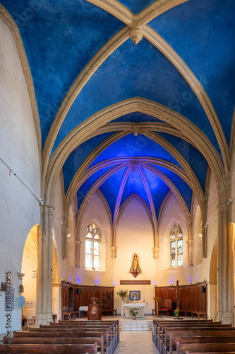 Cotignac, Var, France : interior of Notre-Dame de Grâces sanctuary with blue gothic vaulted ceiling. Catholic pilgrimage church dedicated to the Virgin Mary