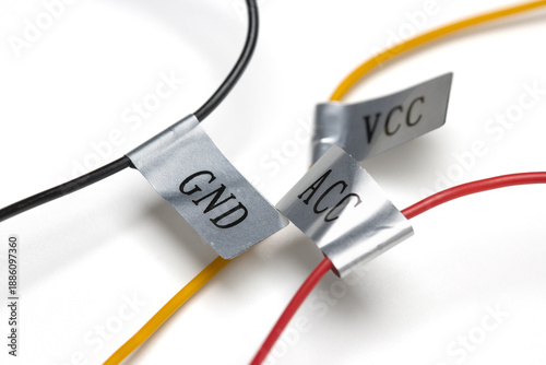 labels on automotive wiring harness, showing ACC for Accessory Power, GND for Ground and VCC for Constant Power.