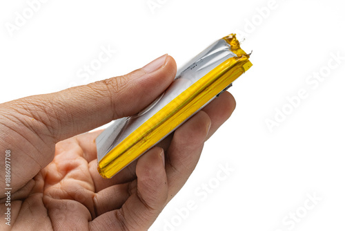 Tableau sur toile hand holding swollen lithium ion battery isolated on white background