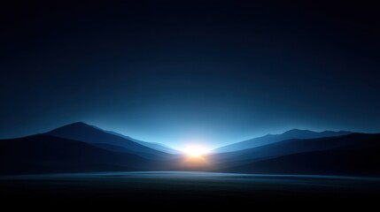 Serene Night Landscape with Soft Blue Hues Illuminating the Horizon and Mountain Silhouettes Against a Dark Sky