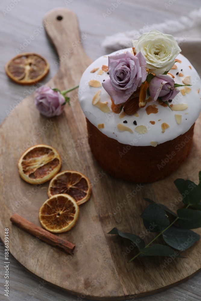 Fototapeta premium Traditional decorated Easter cake on wooden table
