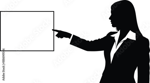 Silhouette of a professional business woman pointing at a blank white presentation board for marketing message and copy space