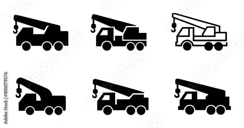 Silhouette collection of tow trucks on grey striped background