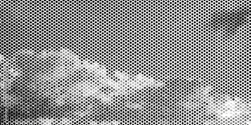 Abstract monochrome texture featuring a grainy pixelated cloud like pattern
