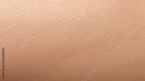 Close-up of human skin texture with subtle variations and natural tones.