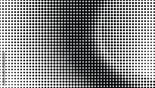 Halftone pattern with gradient effect in black and white dots on screen