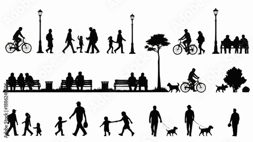 Silhouettes of People and Dogs in a Park Setting.