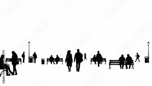 Silhouettes of people enjoying a public park on a bright day.