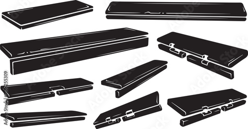 Collection of black binder clips in various orientations displayed