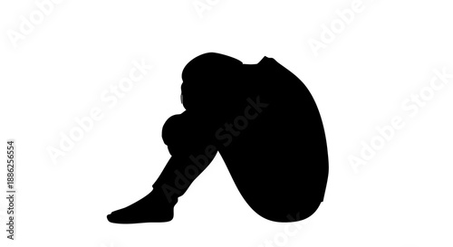 Person sitting in a contemplative pose with head down silhouette against a plain white background expressing sadness or despair emotional state mental health concept