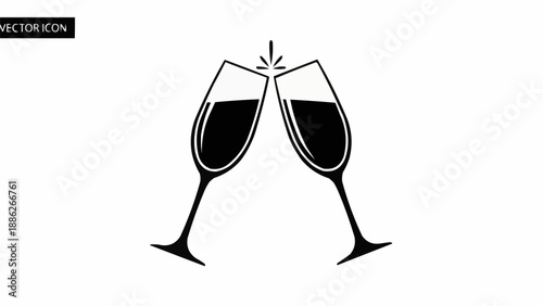 Two champagne glasses clinking together in celebration.