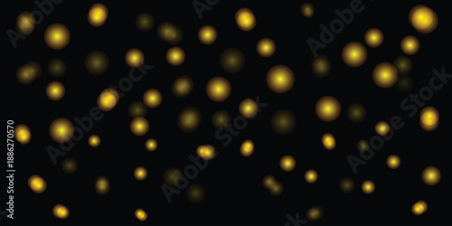 Blurry yellow lights on black background
