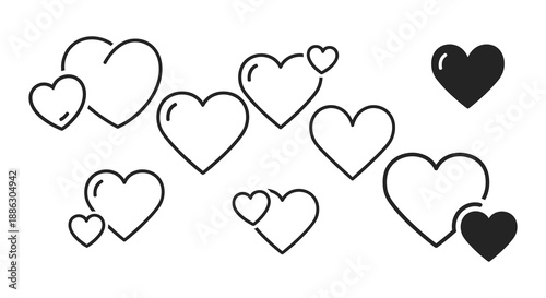 A scattering of black and white heart shapes creates a playful and affectionate visual arrangement high quality professional