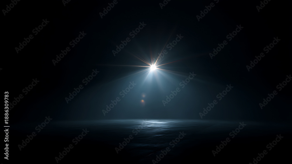 Fototapeta premium Bright Spotlight Beam Cutting Through Darkness onto a Reflective Surface