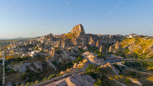 Wallpaper Mural Uchisar, Nevsehir, Turkey. Aerial view of Uchisar Castle, the highest point in Cappadocia, showing rock-cut architecture and surrounding cave houses in morning light.. Aerial View Torontodigital.ca