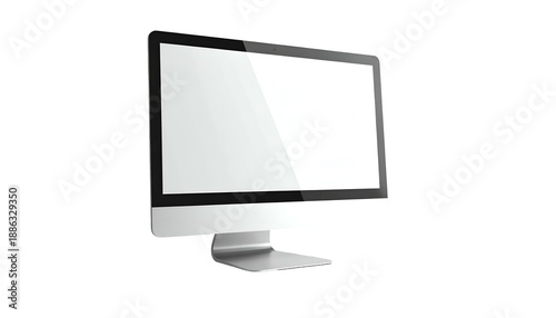 Sleek, silver desktop computer with a bright, blank screen, set against a black backdrop
