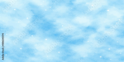 Beautiful abstract blue winter sky background featuring fluffy white clouds and bright sunlight for a clear nature cloudscape