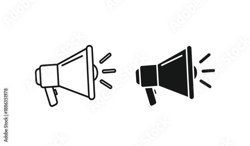 Two megaphones one black and one white with sound waves emitting from them